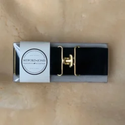 Bedford Jones Belt - Black W/ Gold Surcingle 2.0"